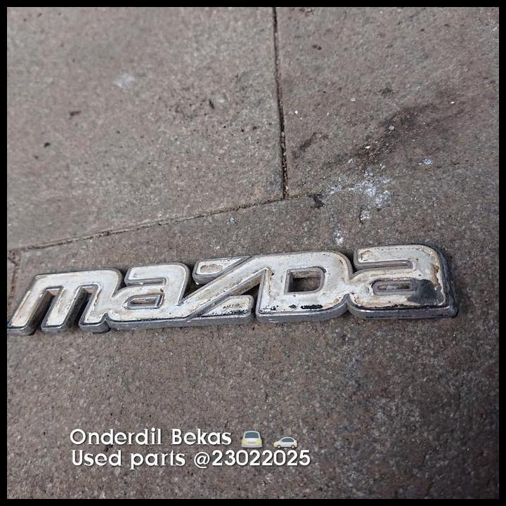 TERLARIS EMBLEM GRILL MAZDA 323 ELITE 