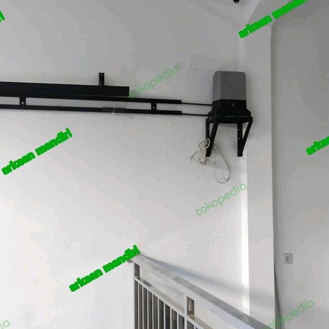 Pintu Garasi Tikung Otomatis