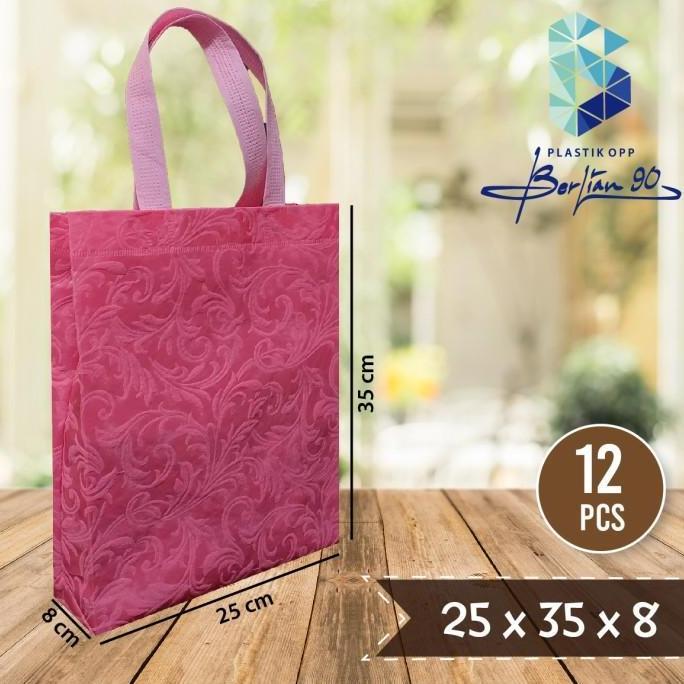 Goodie Bag standing handle emboss 25 x 35 Tas Spunbond Tali emboss