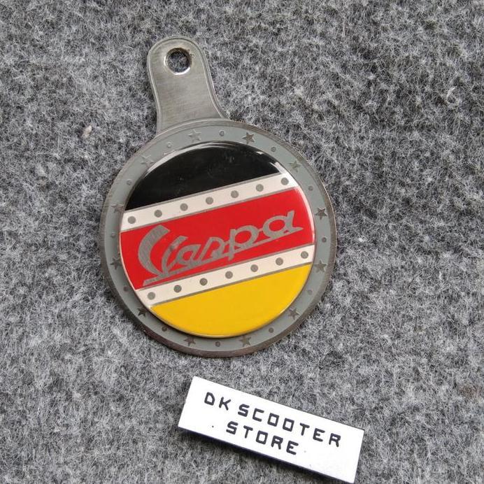 Vespa emblem tax holder