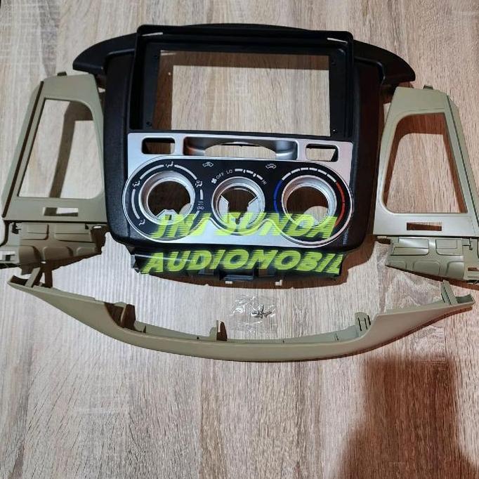 DN13 - Frame tv mobil head unit android 9 inch mobil toyota innova G 2005-2010