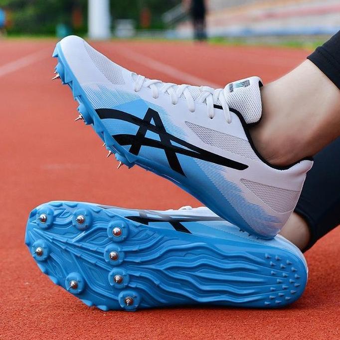 Track and field spikes sprint spikes lari lompat jauh sepatu lari lomp .