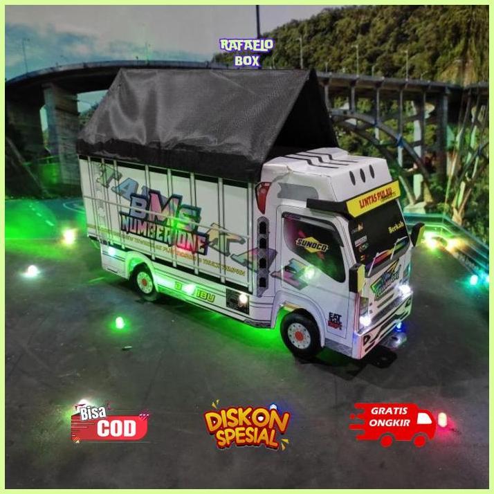 RAFAELOBOX PROMO MINIATUR TRUK MURAH TRUK OLENG LAMPU TERPAL BISA BELOK MAINAN ANAK TAWAKAL PUTIH 5 