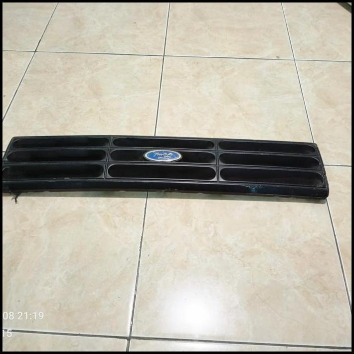 TERLARIS GRILL FORD LASER CHAMP 1990 1996 WARNA MERAH ORIGINAL COPOTAN 