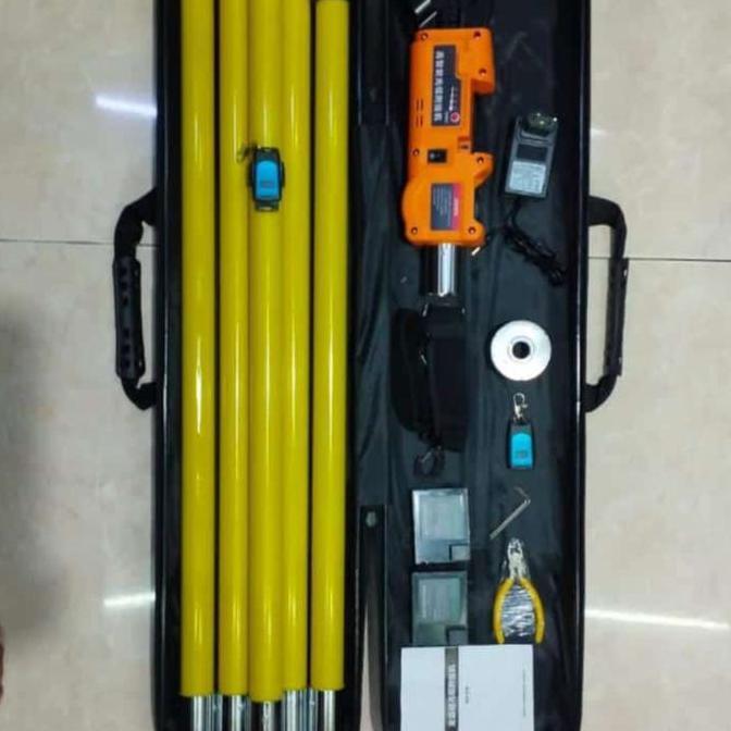 ALAT PENGIKAT MERAPIKAN KABEL UDARA