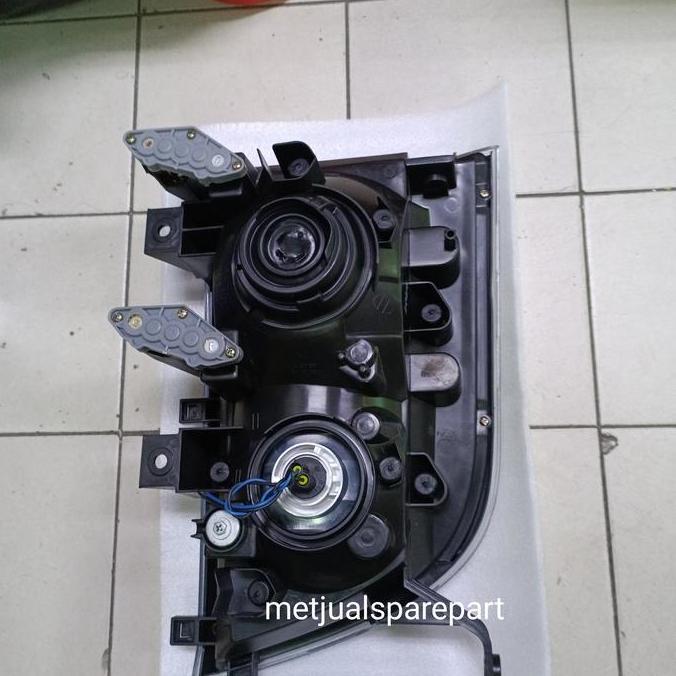 lampu depan head lamp isuzu elf sebuah