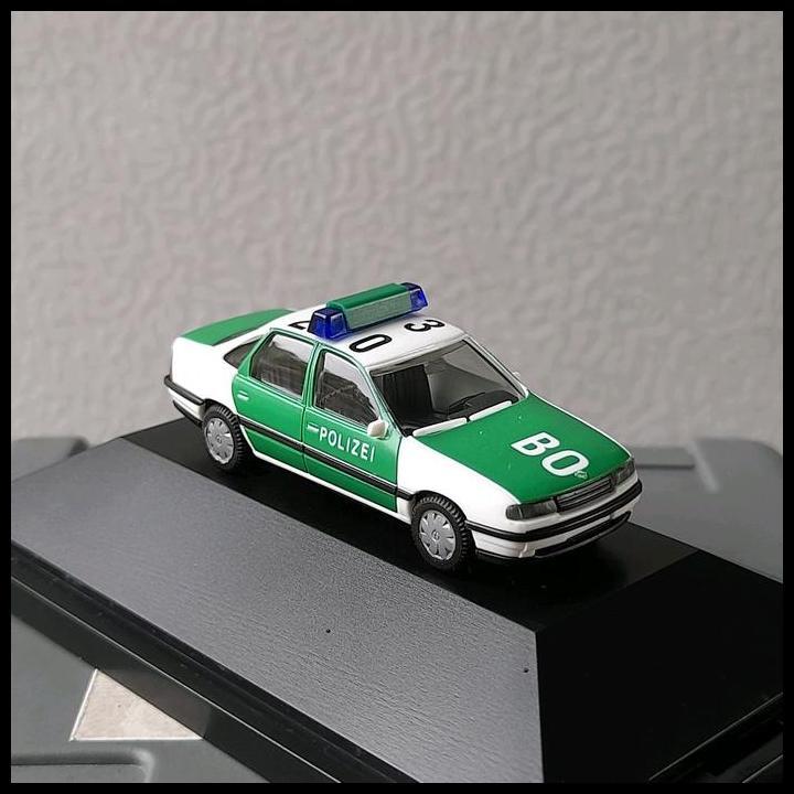 DISKON HERPA SKALA 1:87 - OPEL VECTRA PUTIH-HIJAU POLIZEI (HC12) 