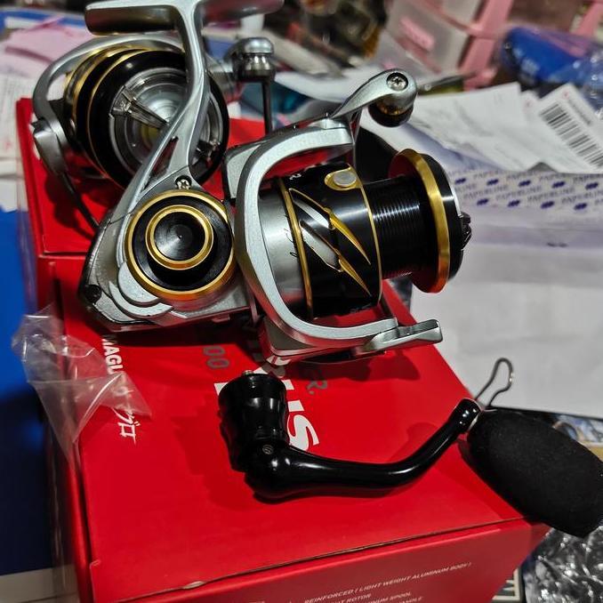 reel maguro virus 2500 atau 3000 power handel