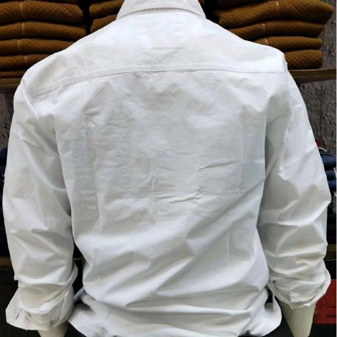 KEMEJA PRIA LENGAN PANJANG WARNA PUTIH REGULER FIT CARDINAL CASUAL