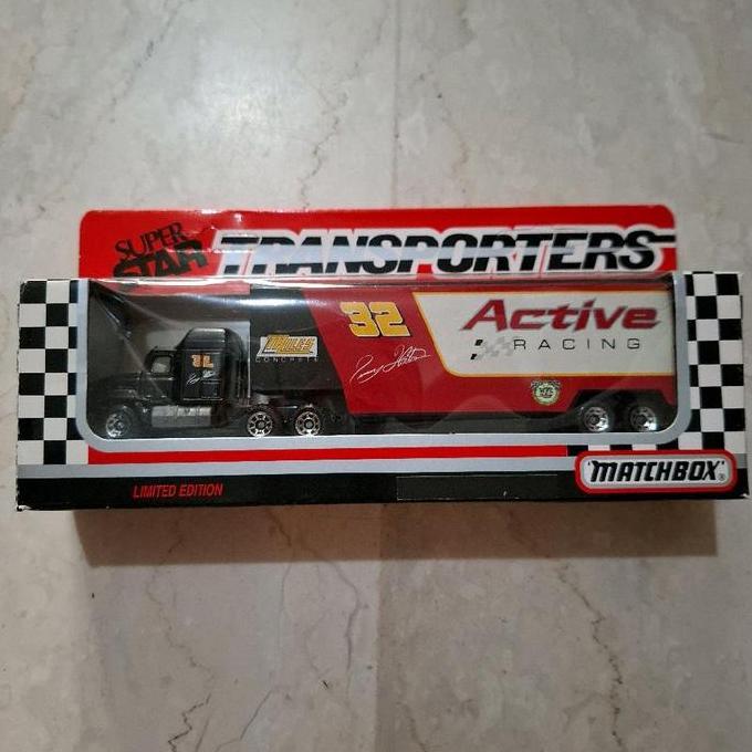matchbox transporters mack ch600 low bed trailer  active racing 1990