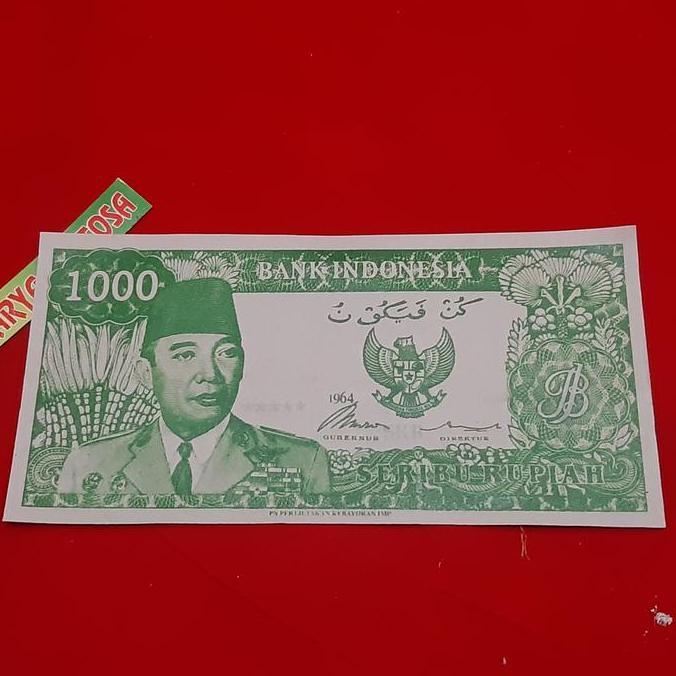 uang soekarno serimpi 9 melengkung pecahan 1000 rupiah hijau