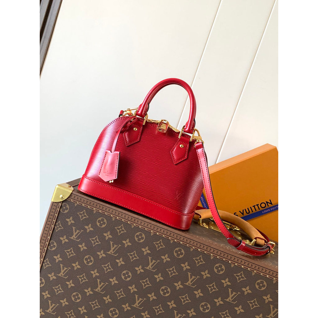M24645 Lv Alma BB epi clamshell handbag with productive feet