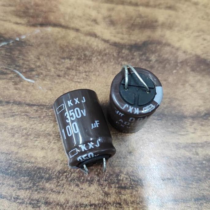 capasitor 100uf 350V coklat 105c