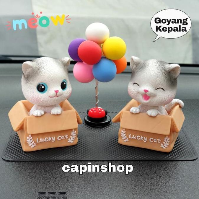 hiasan dashboard mobil kucing