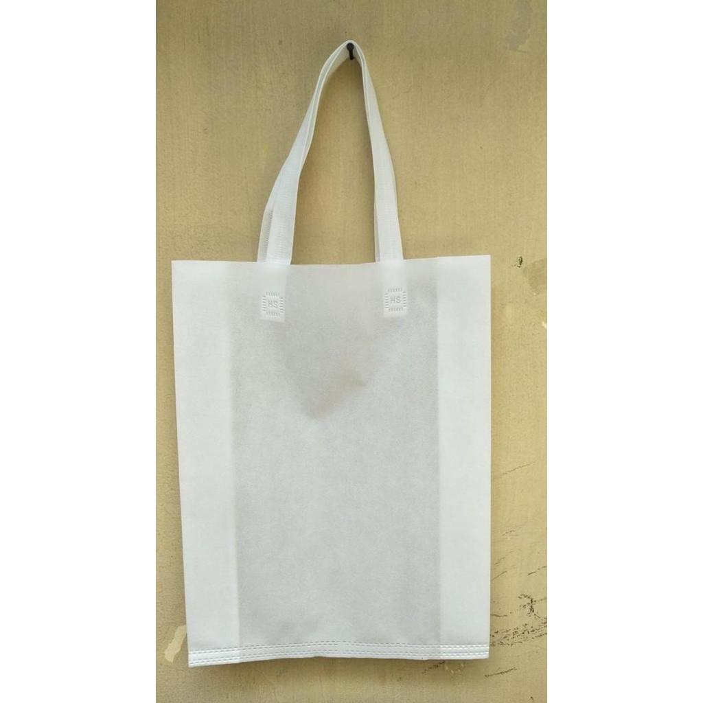 Tas Spunbond sablon 30x40x10 gramasi 75 / Goodie Bag Souvenir promosi