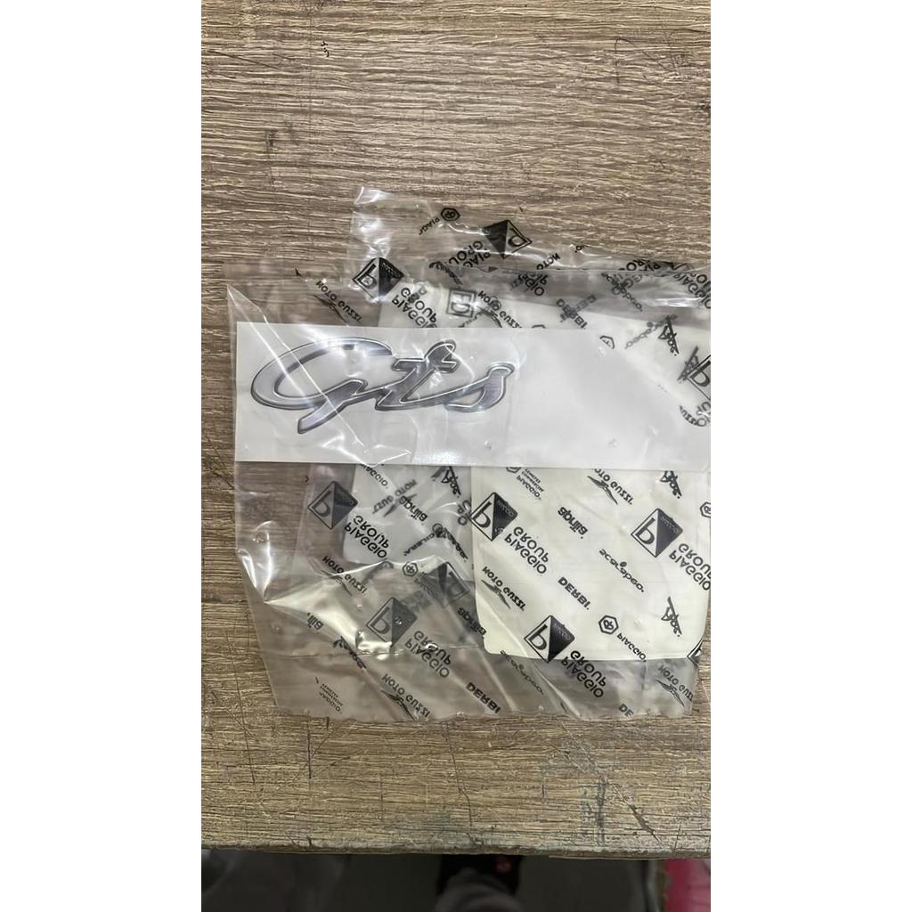 Sparepart Vespa Emblem sticker GTS body samping Original