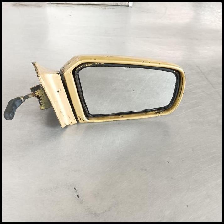 TERLARIS SPION MAZDA 323 ELITE TRENDY PNP FORD LASER ORIGINAL SISI KANAN 