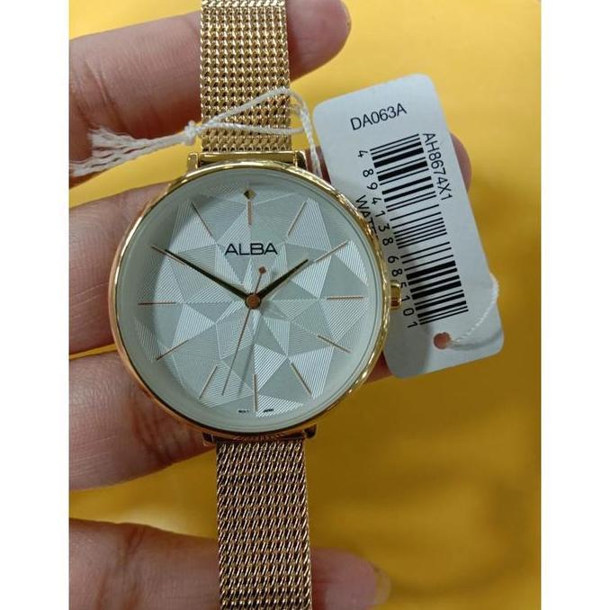 Alba Jam Tangan Wanita AH8674 / AH8674X1 Quartz Silver White Dial Gold Stainless Steel Mesh Bracelet