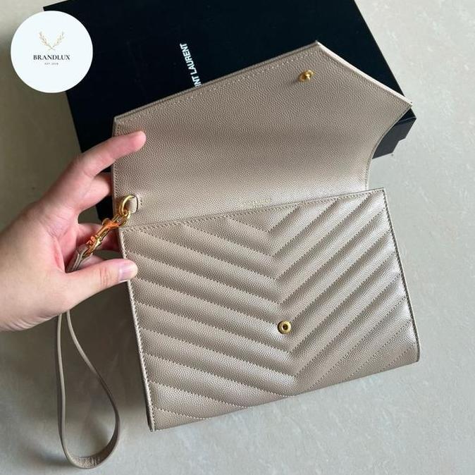 YSL monogram clutch with wristlet in dark beige ghw
