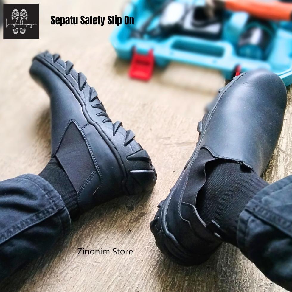 Grade Ori Sepatu Safety Pria Ujung Besi Sepatu Safety Slip On Tanpa Tali Warna Hitam Ukuran 38 - 44