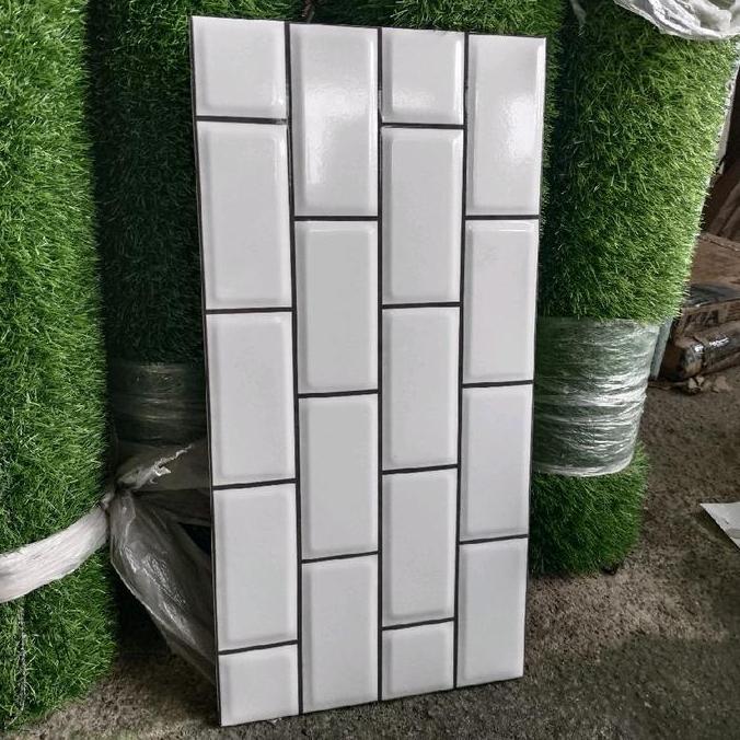 KERAMIK 25X50 GLOSSY BATA PUTIH MOTIF /  KERAMIK 25X50 BATA BEVEL