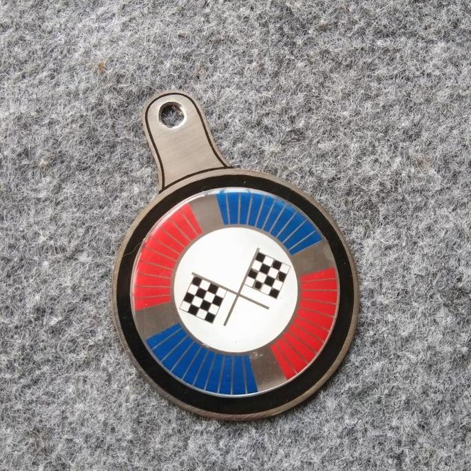 CORNUE Emblem tax holder vigano