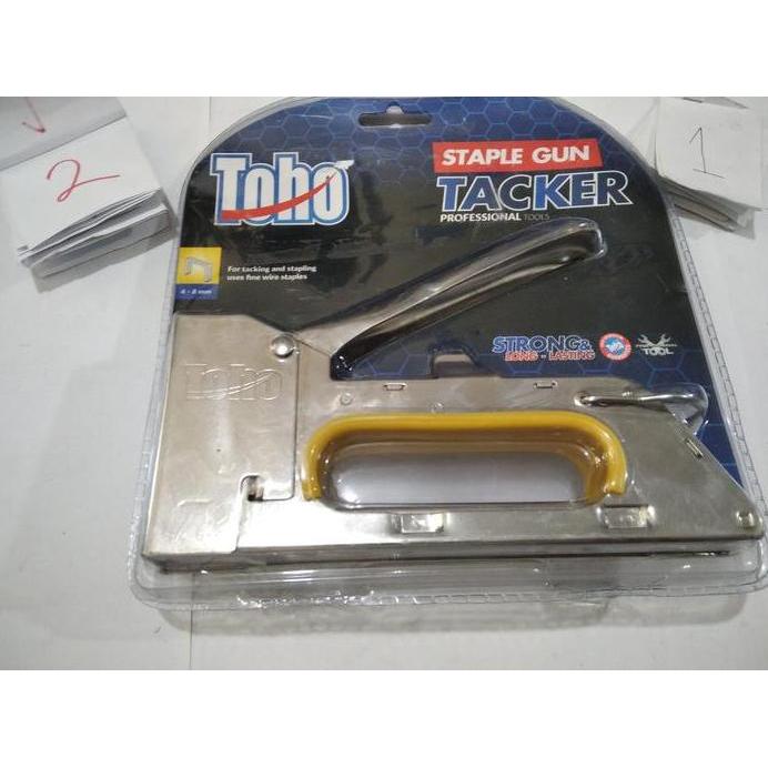 mesin staples tembak penempel kertas taplak meja gun tacker toho