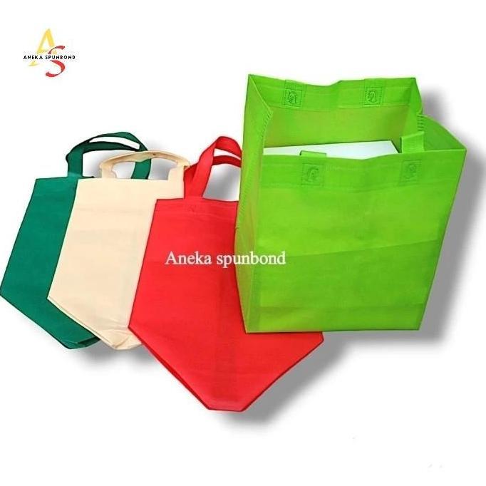Goodie bag Box bag uk 18 Tas spunbond model mcd ( isi 12 pcs)