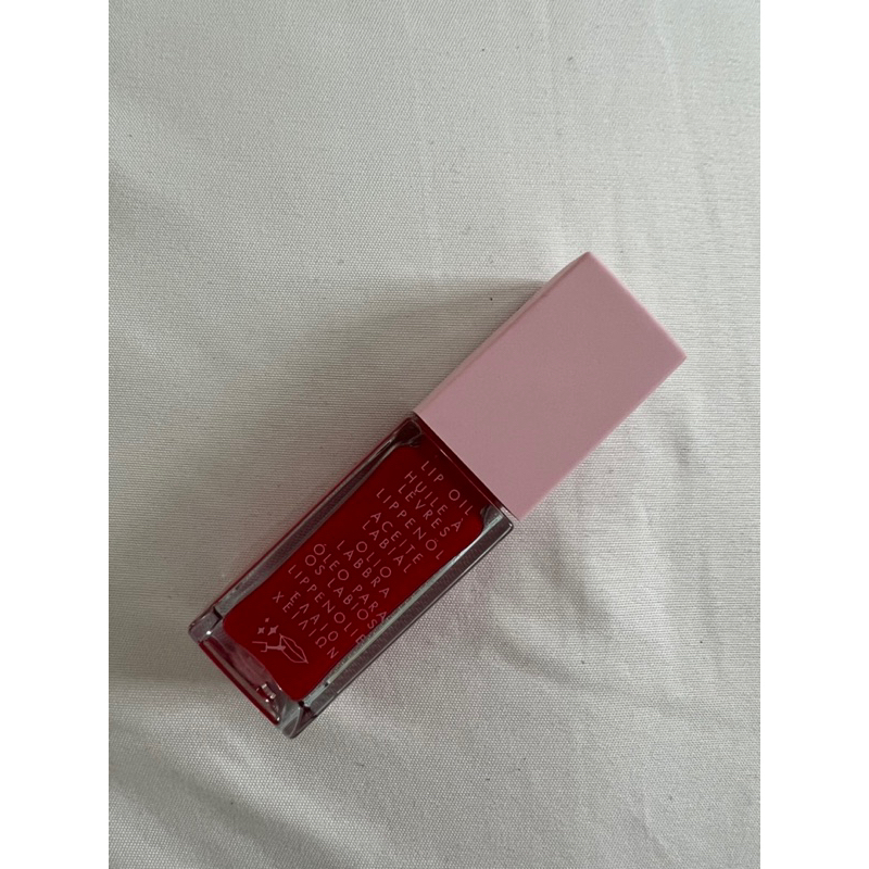 Kylie skin lip oil tinted pomegranate grenade