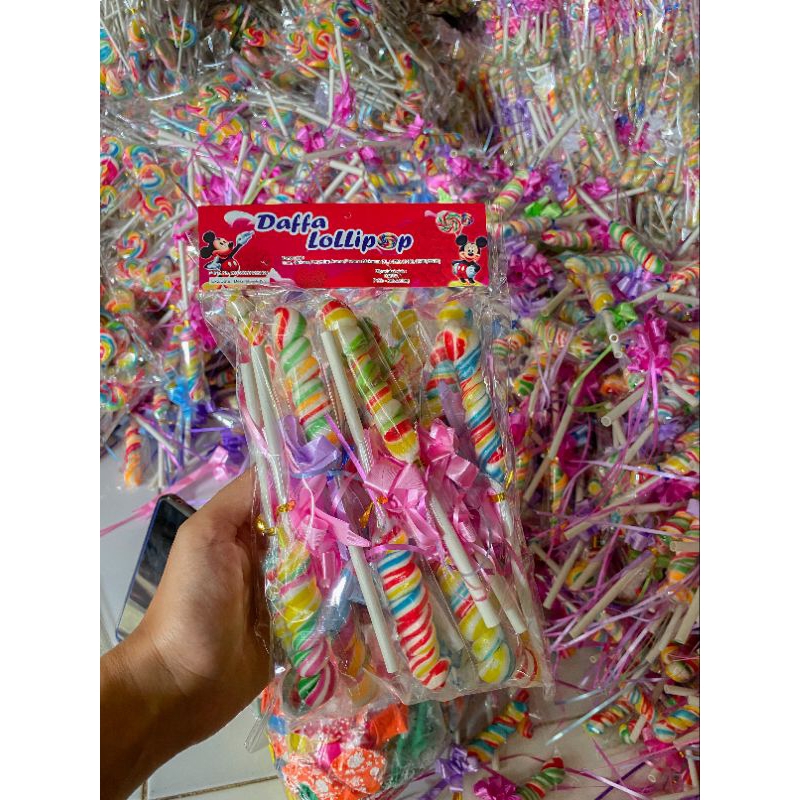 

PERMEN LOLLIPOP ULIR PITA ISI 20 PCS BY DAFFA LOLLIPOP PABRIK PERMEN