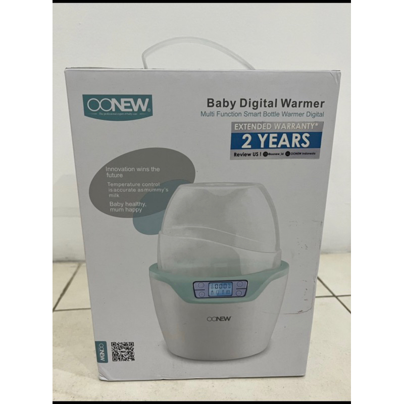 Preloved oonew bottle warmer