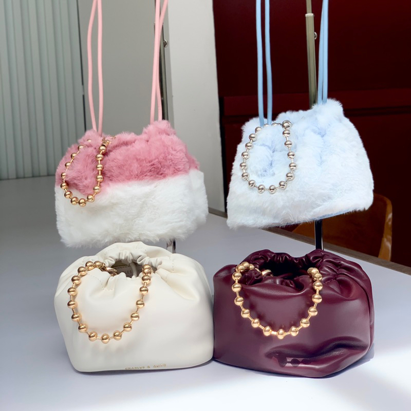 CK MINI BUCKET FURRY