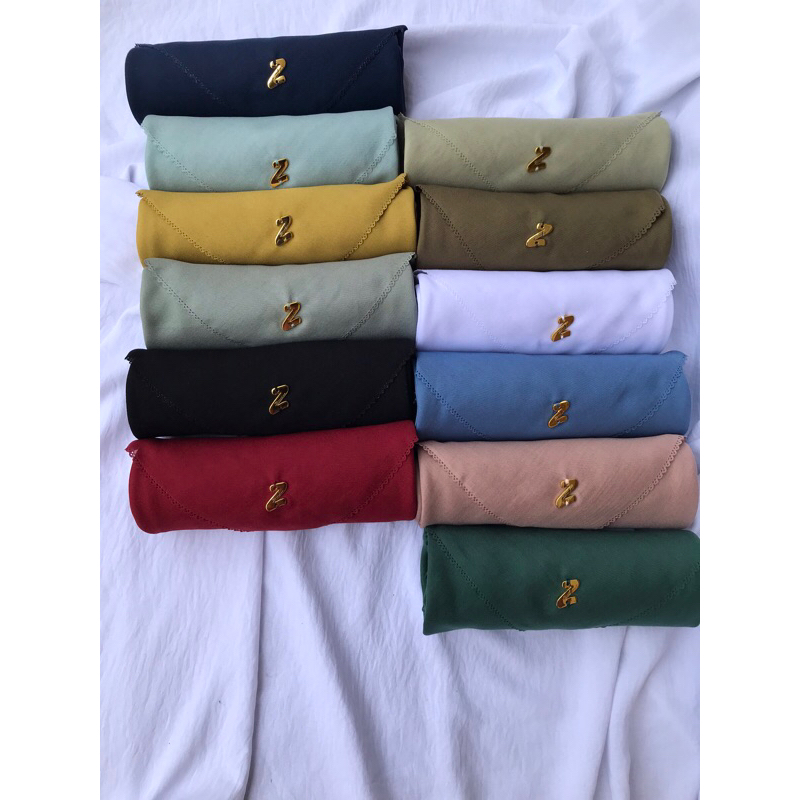 Hijab Segiempat Polos Lasercut By Zenobia Scarves