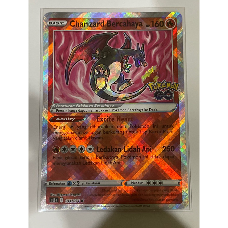pokemon tcg charizard bercahaya