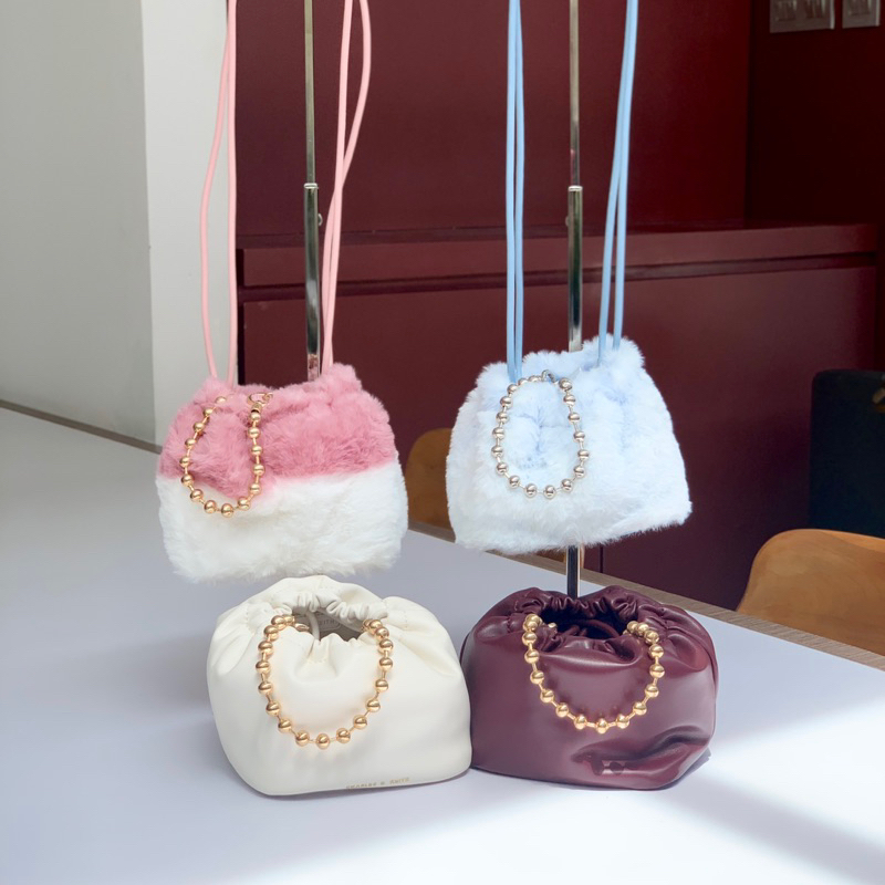 CK MINI BUCKET FURRY