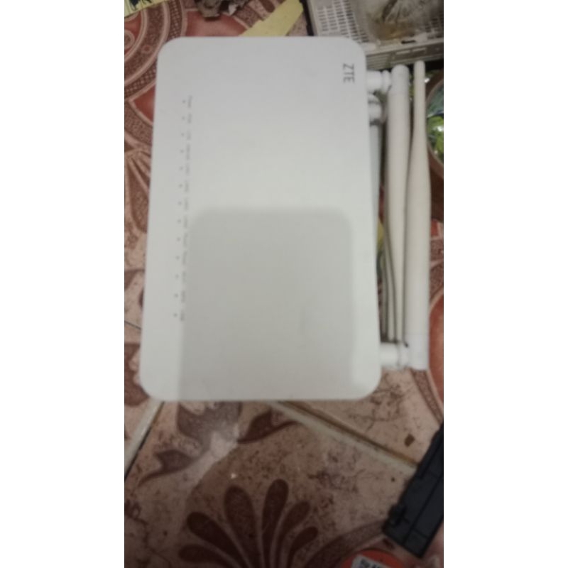 ZTE F609V3 logo zte/fiberstar tanpa adaptor.