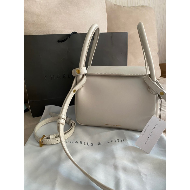 preloved sling bag charles and keith ori counter