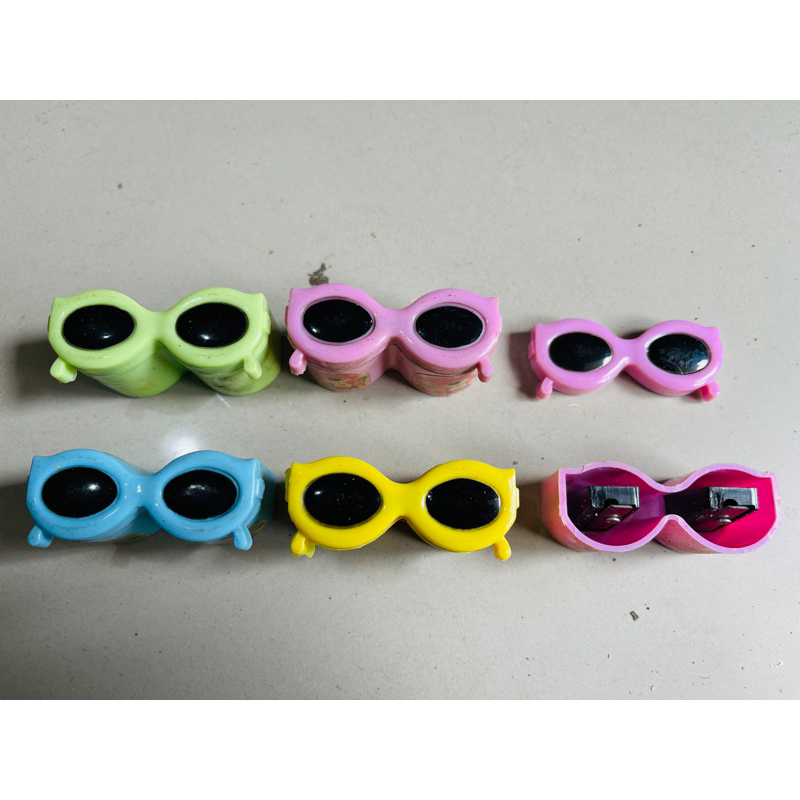 

rautan pensil 2 lobang bentuk kacamata satuan