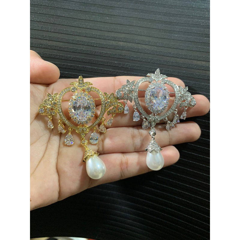 zircon brooch