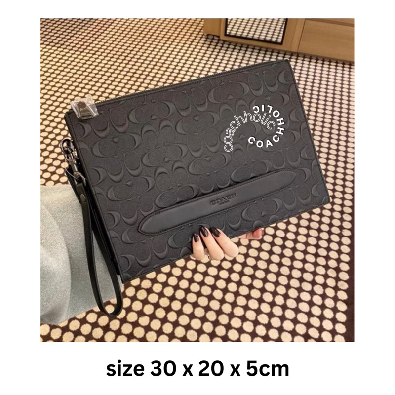 coach clutch structure embossed for men