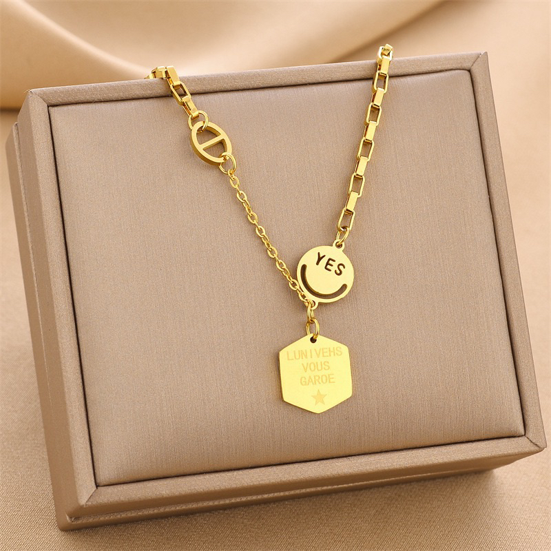 kalung titanium asli yes smiley