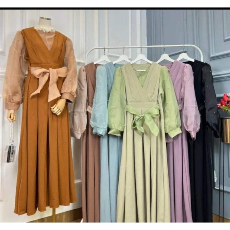 Nira butik kancing bahan mantul