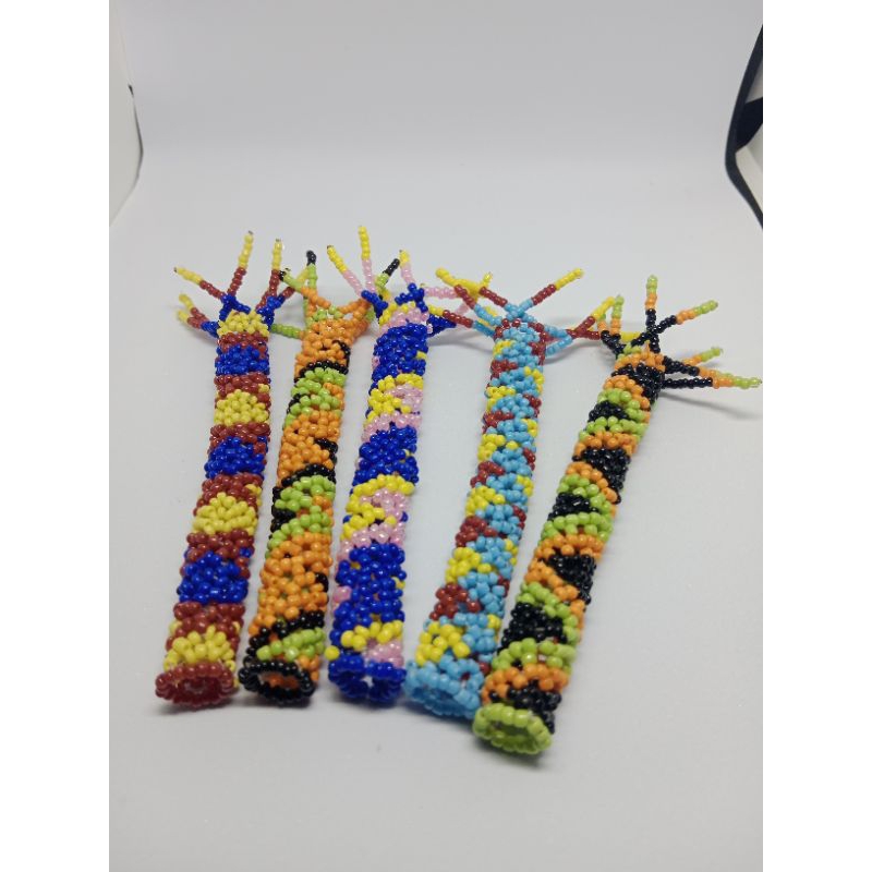 

souvenir pernikahan sarung pulpen manik