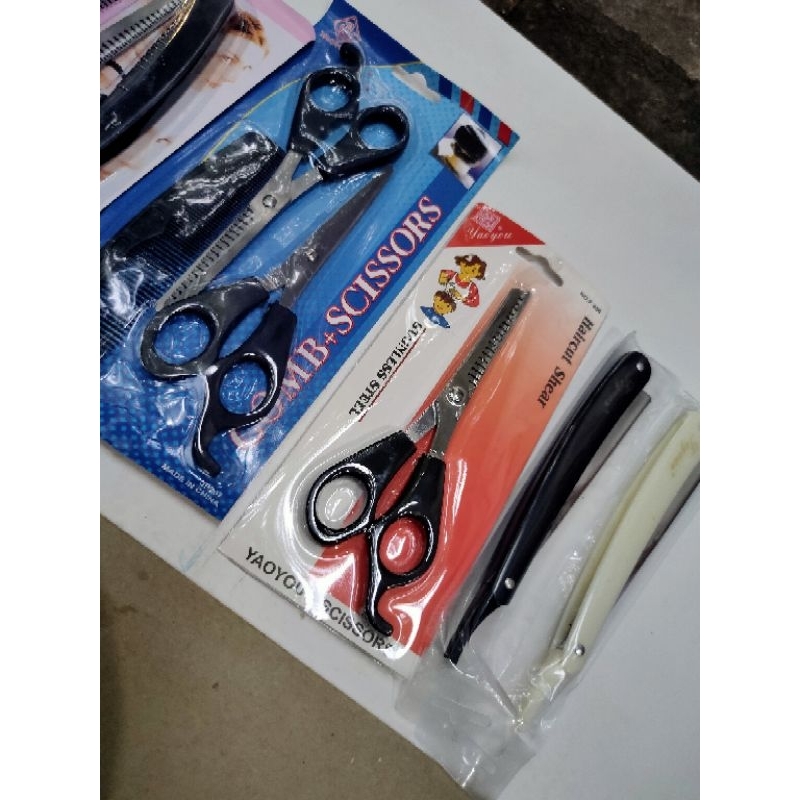 GUNTING SASAK RAMBUT TAJAM