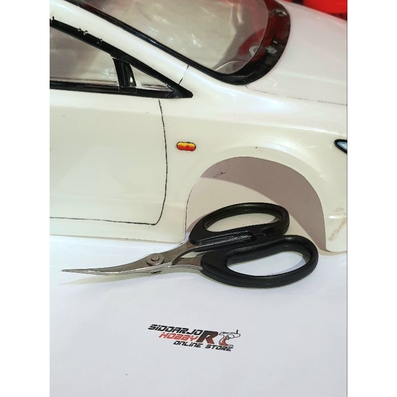 

GUNTING LENGKUNG BENGKOK CURVE SCISSORS GUNTING BODY RC POLYCARBONATE