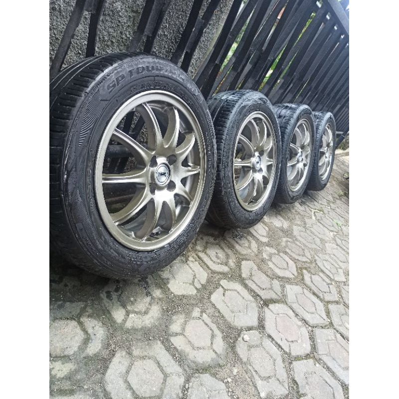 4 Velg R15 PCD 100+Ban 185/60 80% Brio calya sigra agya ayla vios jazz yaris etios lova datsun