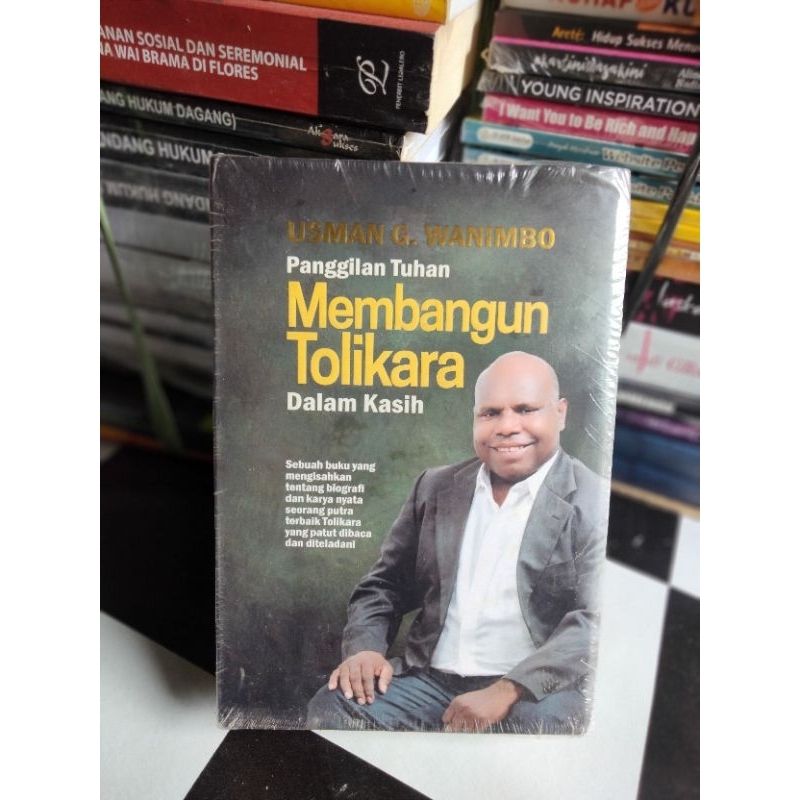 Buku Biografi Panggilan Tuhan Membangun Tolikara Dalam Kasih USMAN G. WANIMBO