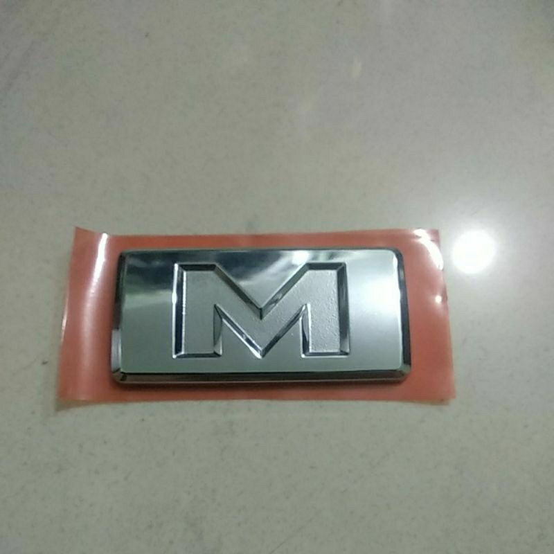 Emblem M Daihatsu Xenia Terios Ayla Sigra original