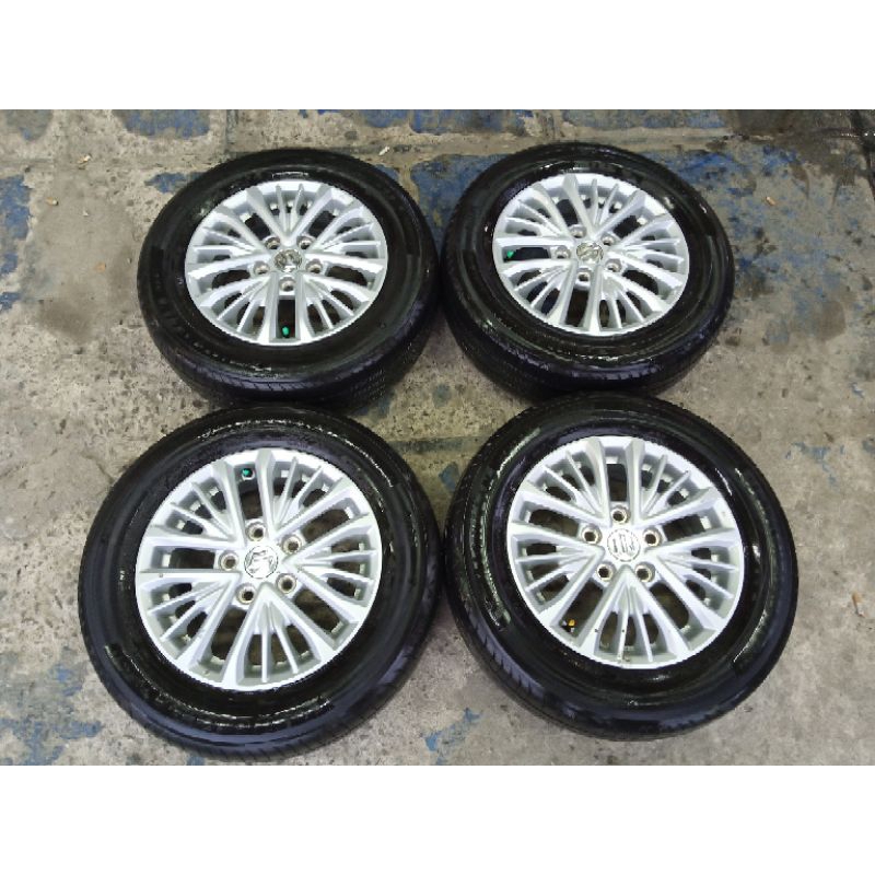 velg mobil bekas copotan ertiga ring 15 baut 5x114 + ban kondisi bagus free ongkir