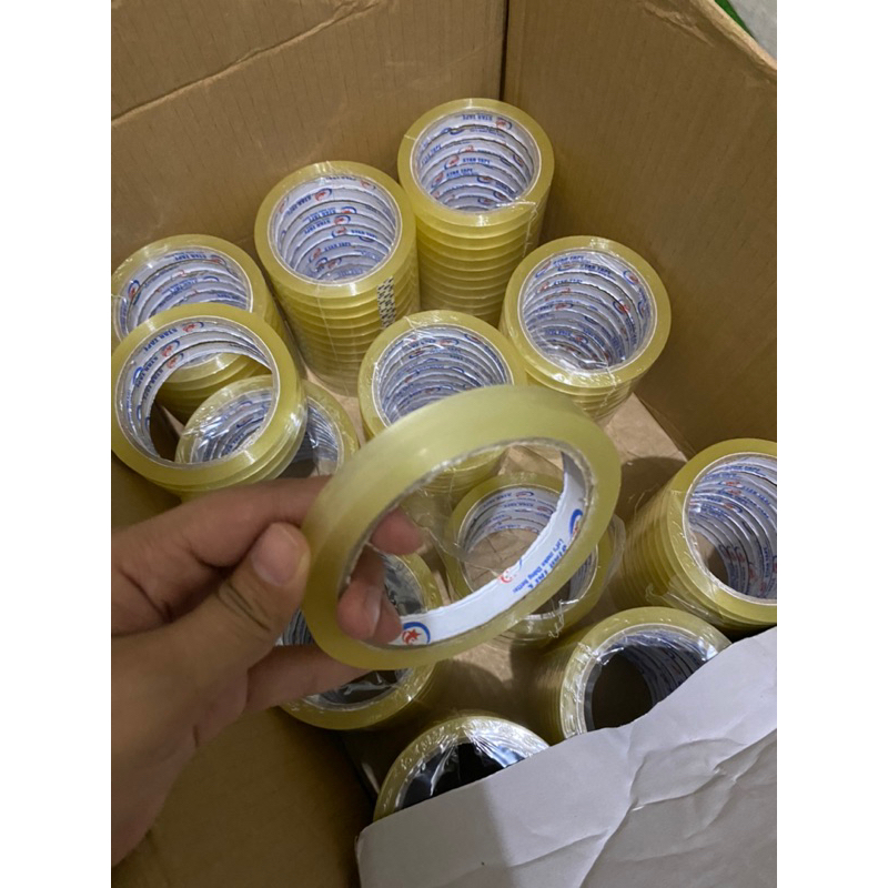 

LAKBAN OPP (12 PCS) CLEAR BENING (KUNING) 12 MM X 90 YARD STAR TAPE MURAHHHHH KUALITAS TERBAIK